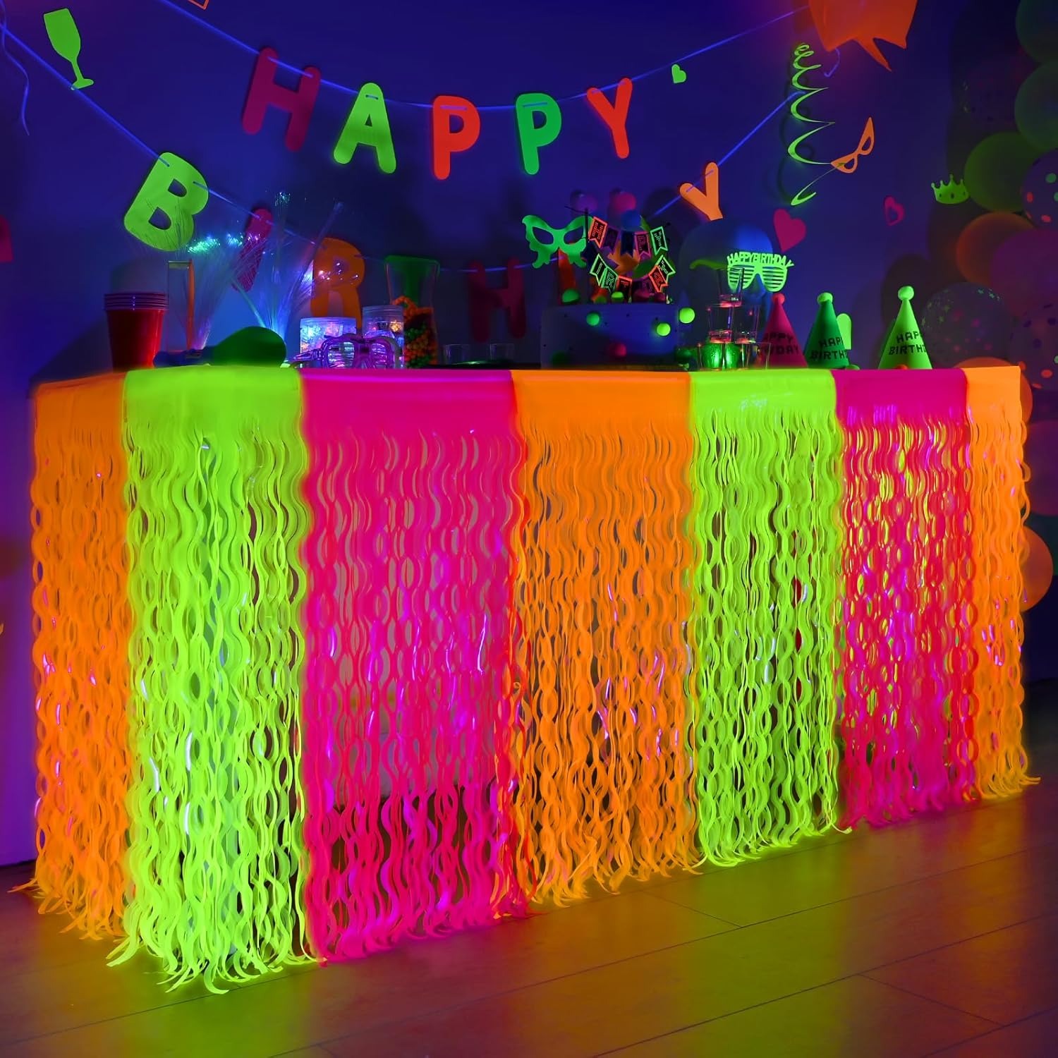 Mega-L Glow in The Dark Party Supplies, 4 Pack Neon Party Decorations Fluorescent Macaron Orange, Yellow and Fuchsia Wavy Metallic Tinsel Foil Fringe Table Skirt, Perfect Glow Birthday Party Decor