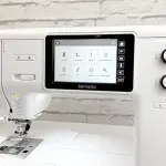 Bernette B79 Computerized Sewing and Embroidery Machine with 5-Inch Color Touchscreen, Multi-Function Knobs, 4 LEDs, and 230mm Sewing Space