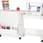 Arrow Sewing Classic Furniture “Judy” Sewing Cabinet: Portable, Folding, Compact, Locking Wheels, with Storage Bin and Hydraulic Machine Lift-White