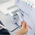 Bernette B64 Airlock Overlocker Sewing Machine with Automatic Air Threader, LED Light, Micro Thread Control - Heavy Duty Serger Quilting & Embroidery, Table