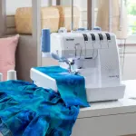 Brother AIR1800 Air Serger with Jet Air Threading, 2/3/4 Thread, LED Lit Work Area, Plus Wide Table Extension and 4-Piece Thread Cones Starter Pack