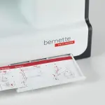 Bernette B33 Swiss Design Sewing Machine | Mechanical, Heavy-Duty, Portable, 15 Built-In Stitches, 5mm Stitch Width, Front-Loading Bobbin, Semi-Automatic Threader, Cutter,10 Bobbins