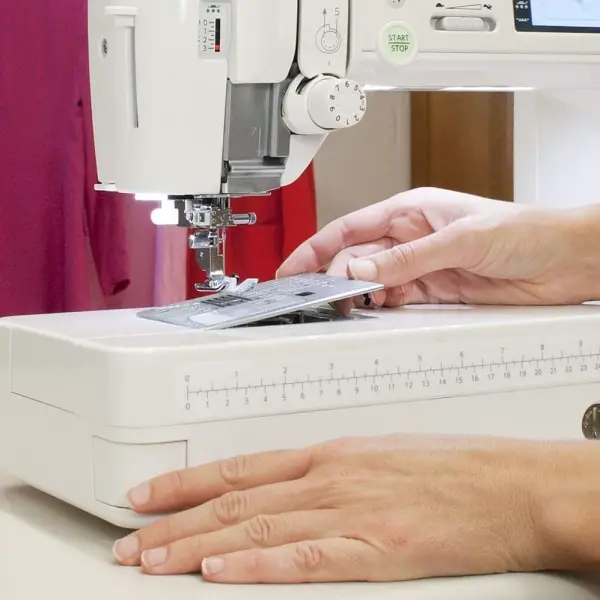Elna Excellence 720 Pro Quilting Sewing Machine, with over 10" of Seamless, Aluminum Flatbed Sewing Space, 200 built-in stitches, Over 40 Standard Accessories, including Extension Table
